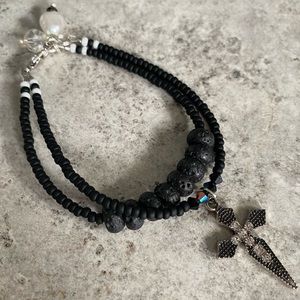 Bracelet double stand with cross